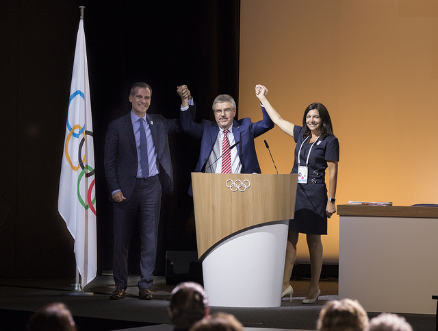 LA Mayor Eric Garcetti (left) with IOC President Thomas Bach and Paris Mayor Anne Hidalgo after IOC votes to award both LA and Paris the Games next decade without election (IOC Photo)