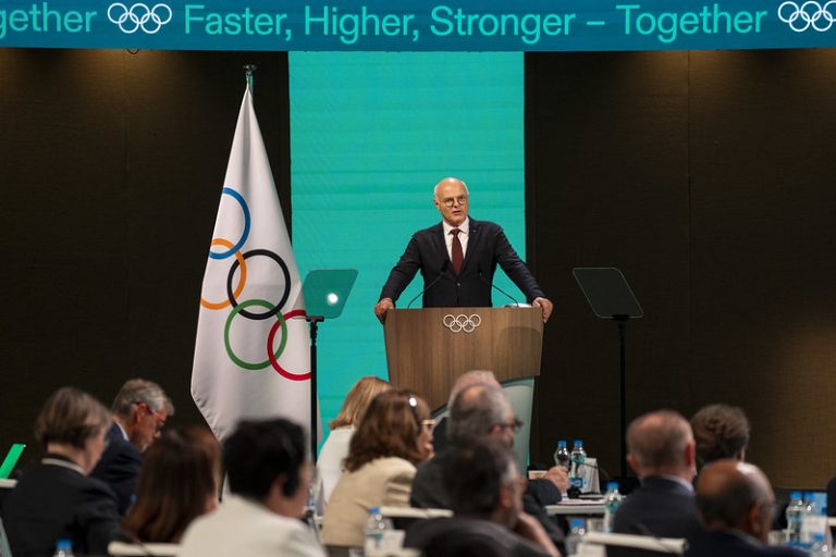 Chair of IOC Future Host Commission for Winter Games Karl Stoss presents at 141st IOC Session in Mumbai, India 15 October 2023 (Photo: IOC/Greg Martin)