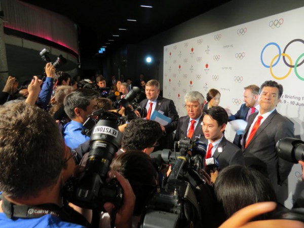 Media dig for details as Almaty 2022 team exit technical presentation to IOC at Olympic Museum in Lausanne (GamesBids Photo)