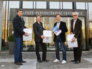 Edgar Grospiron (third from left) and his team present Annecy 2018 Olympic bid book to IOC