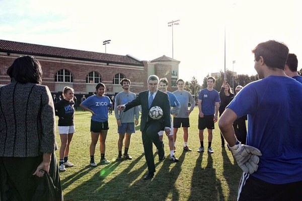 IOC President Thomas Bach practices soccer with students at UCLA (LA 2024 Facebook Photo)