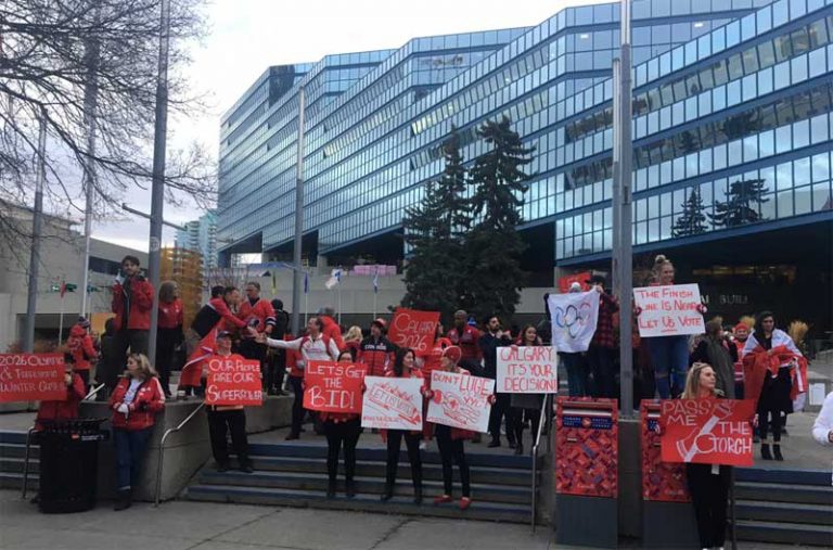 Calgary 2026 Olympic bid supporters rally in front of City Hall, urging Councilors to vote bid through to a plebiscite (@YesCalgary2026 Photo)