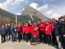 IOC Evaluation Commission team and Milano-Cortina 2026 bid team pose after viewing proposed site for temporary Cortina Olympic Village (GamesBids Photo)