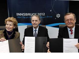 IOC President Jacques Rogge (centre) attends host city contract signing for the Innsbruck 2012 Olympic Youth Games