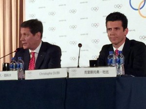 IOC Evaluation Commission Chief Alexander Zhukov and IOC Executive Director Christophe Dubi take questions during press conference in Beijing, March 28, 2015 (GamesBids Photo)